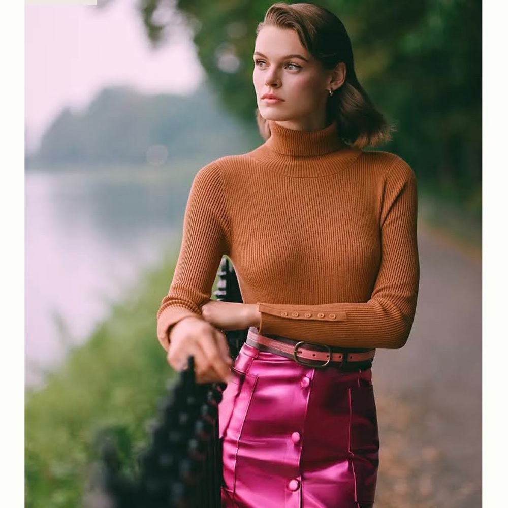 NWT ribbed caramel / copper colored turtleneck with elegant button sleeve